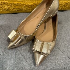 Salvatore Ferragamo Metallic Gold Leather pointed toe flats.